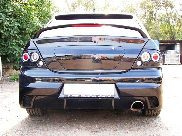 Декоративная заглушка крышки багажника в стиле EVO для Mitsubishi Lancer IX (2003-2009) купить недорого с доставкой в Архангельск