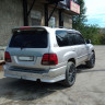 Накладки на задний бампер (сток) Toyota Land Cruiser 100 купить недорого с доставкой в Архангельск