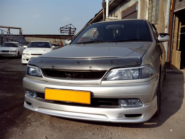 Накладка на передний бампер Toyota Carina (210) Рестайлинг купить недорого с доставкой в Архангельск